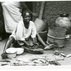 Woman grinding pepper