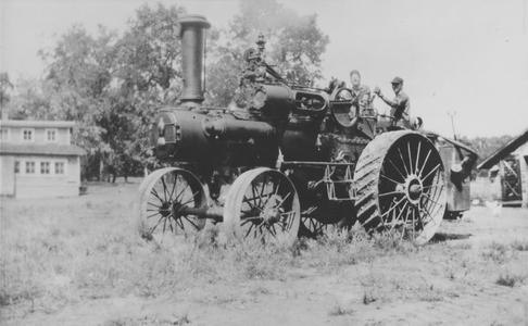 Leonard Finseth and one of his brothers on a steam engine