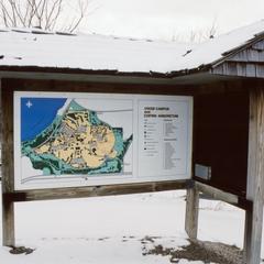 Trail map sign near the Cofrin Memorial Arboretum