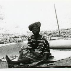 Ikeji-Ile woman with mats