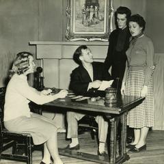 Alpha Psi Omega - Performing a play onstage, living room scene