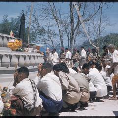 People praying at Bodhi tree