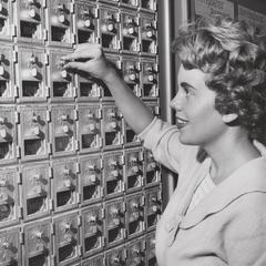 Student opens mailbox