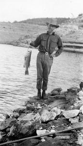 With fresh catch, Roosevelt Dam, Tonto National Forest, Arizona, 1923