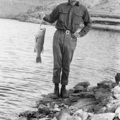 With fresh catch, Roosevelt Dam, Tonto National Forest, Arizona, 1923
