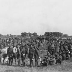 Soldiers of the US Army's 15th Infantry Regiment line up to get food.