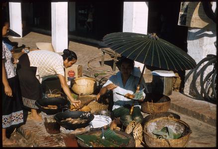 Lao women--selling fried bananas