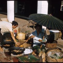 Lao women--selling fried bananas