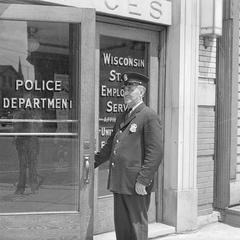 Officer Diegel at Police Department door