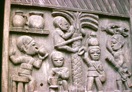 Yoruba Wood Carving Depicting Activities Including Harvest of Coconuts