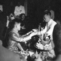 Royal couple during marriage ceremony at the palace