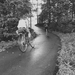 Two bicyclists on Cofrin Memorial Arboretum trails