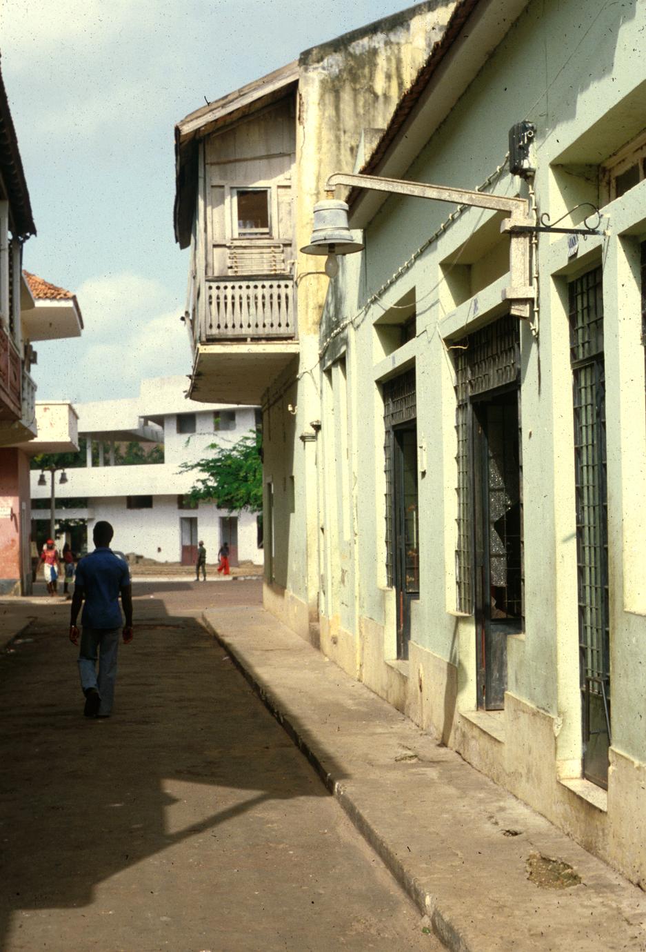 Narrow Street and Street Lamp in Urban Bissau