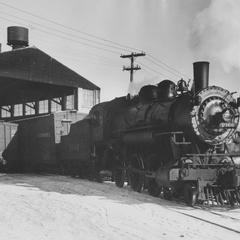 Steam railroad engine 1066 leaving Hamilton Manufacturing Company dock area on East Twin River