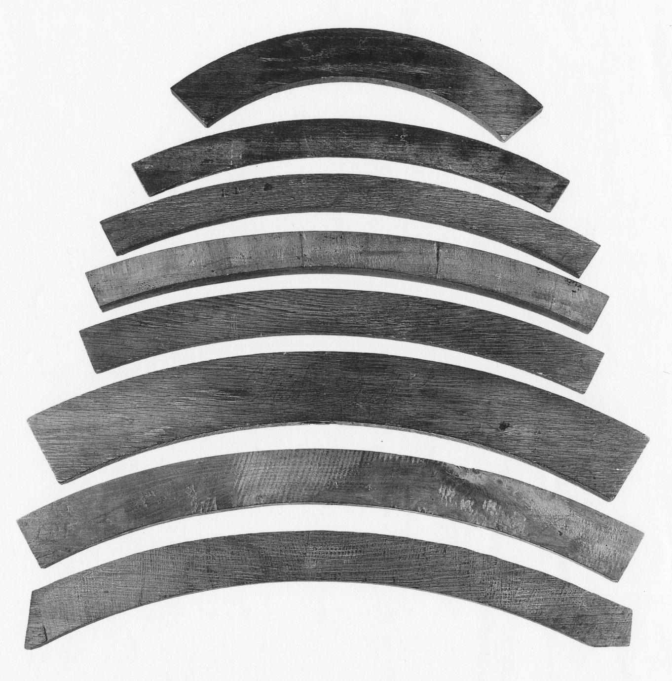 Black and white photograph of various wheel rim or felloe patterns.
