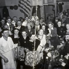 Close-up of revelers at Jack Peters' tavern